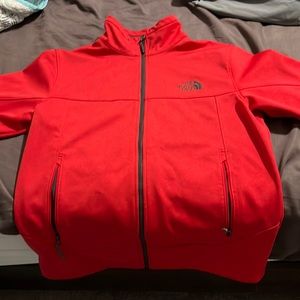 Red North Face jacket